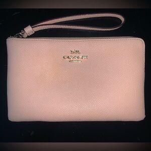 Peach authentic Coach wristlet